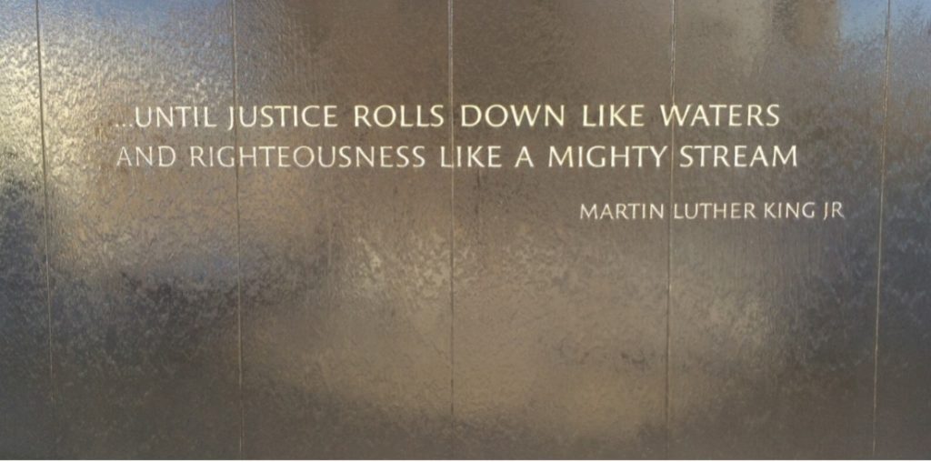 Quote by Martin Luther King Jr.: "...until justice rolls down like waters and righteousness like a mighty stream"